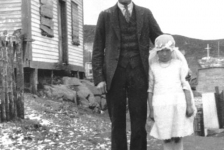 154: J V McCarthy and his daughter Mollie in her First Communion dress. Jer Ryan's house at left  (family had moved to Grand Falls). (circa 1928)  - J V son of Thomas McCarthy &amp;amp; Anastasia Fitzgerald